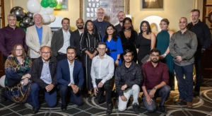 The TGOOD Australia team in attendance at our 10-year anniversary dinner, standing together at Customs House